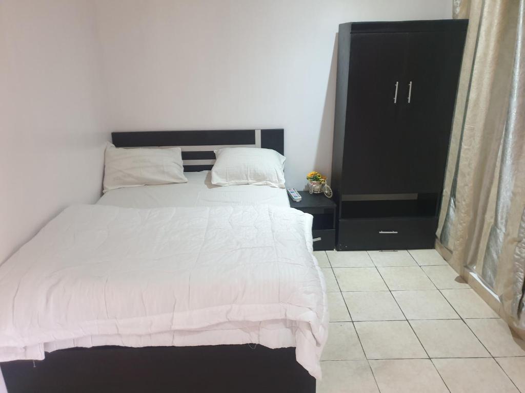 Postel nebo postele na pokoji v ubytování Vee homes