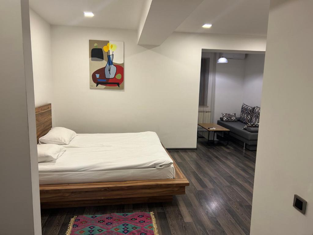 Postel nebo postele na pokoji v ubytování One Day Hotel