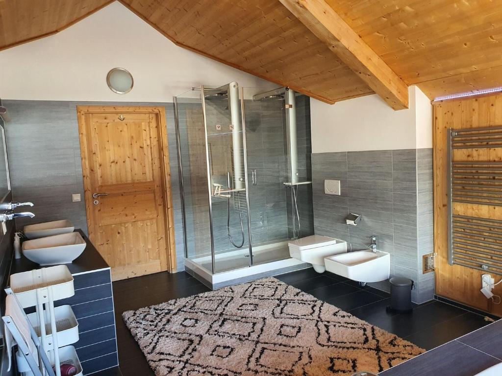 a bathroom with two sinks and a shower at Exclusive chalet in Hohentauern in ski area in Hohentauern