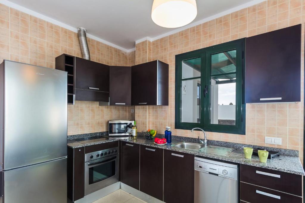 Kuchyň nebo kuchyňský kout v ubytování Villa Manrique by Villa Plus