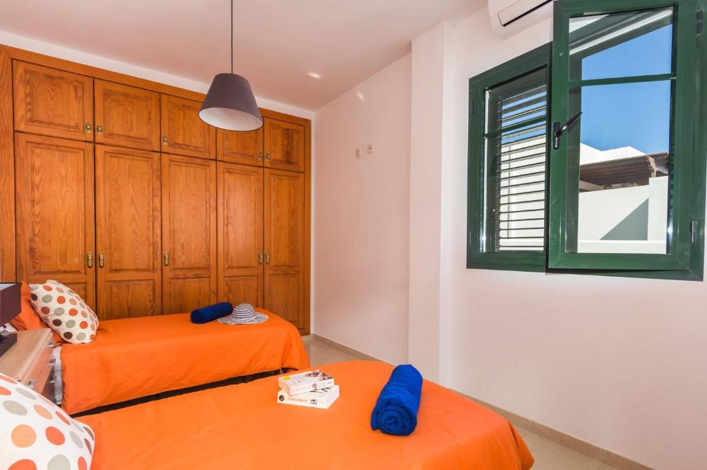 Postel nebo postele na pokoji v ubytování Villa Manrique by Villa Plus