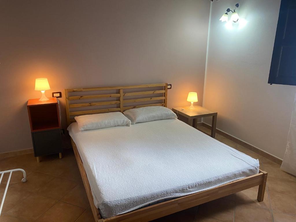 Postel nebo postele na pokoji v ubytování Appartamento Casa Magnolia