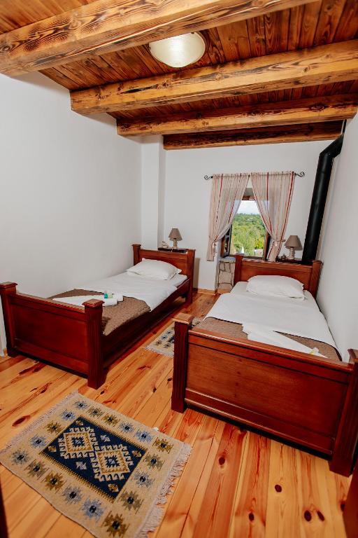 Postel nebo postele na pokoji v ubytování Etno Villa Mokanji