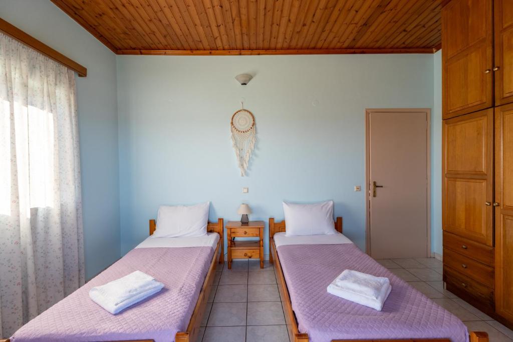 Postel nebo postele na pokoji v ubytování Ocean Breeze Apartment