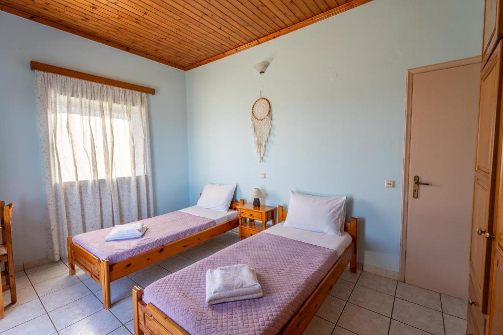 Postel nebo postele na pokoji v ubytování Ocean Breeze Apartment