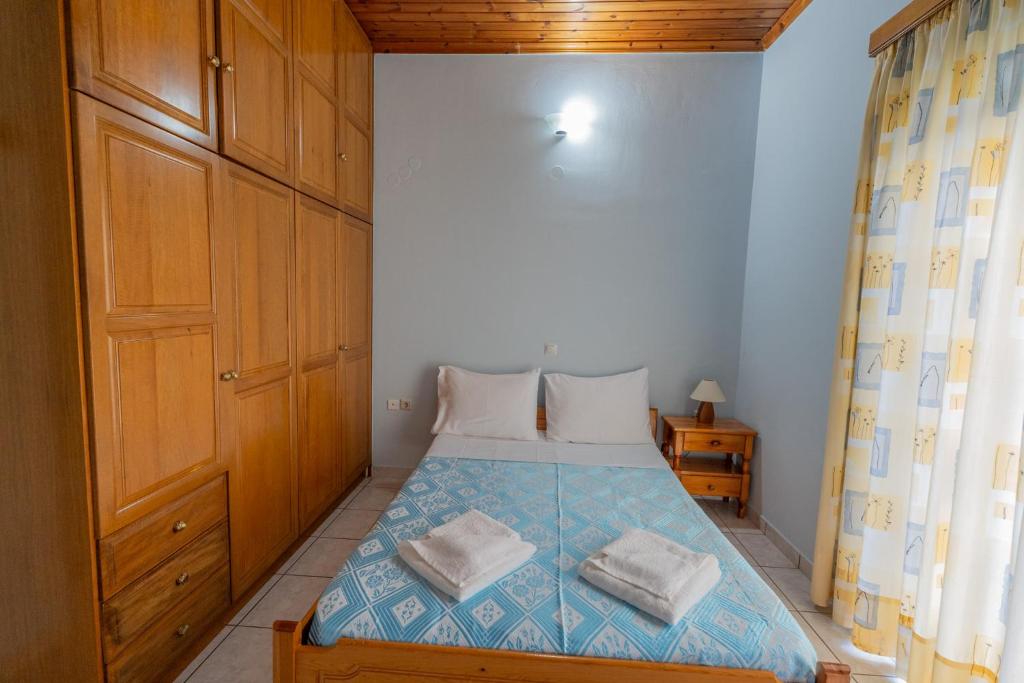 Postel nebo postele na pokoji v ubytování Ocean Breeze Apartment