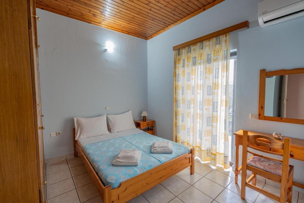 Postel nebo postele na pokoji v ubytování Ocean Breeze Apartment
