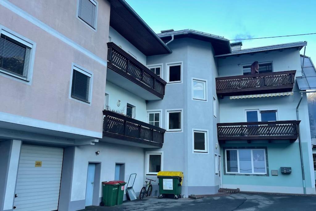 an apartment building with balconies on the side of it at Helle Wohnung mit modernen Flair in Steinfeld