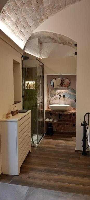 Łóżko lub łóżka w pokoju w obiekcie MATTEI LUXURY B&B