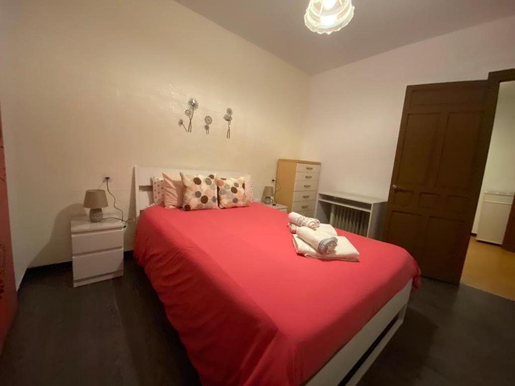 Łóżko lub łóżka w pokoju w obiekcie Apartamento Callejon del Beso