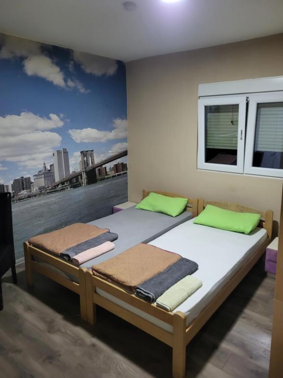 Postel nebo postele na pokoji v ubytování Apartments Day Off