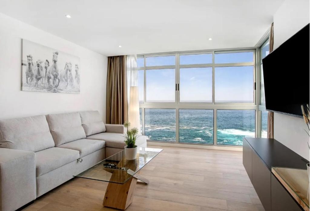 TV a/nebo společenská místnost v ubytování Luxury Loft El Roque 1