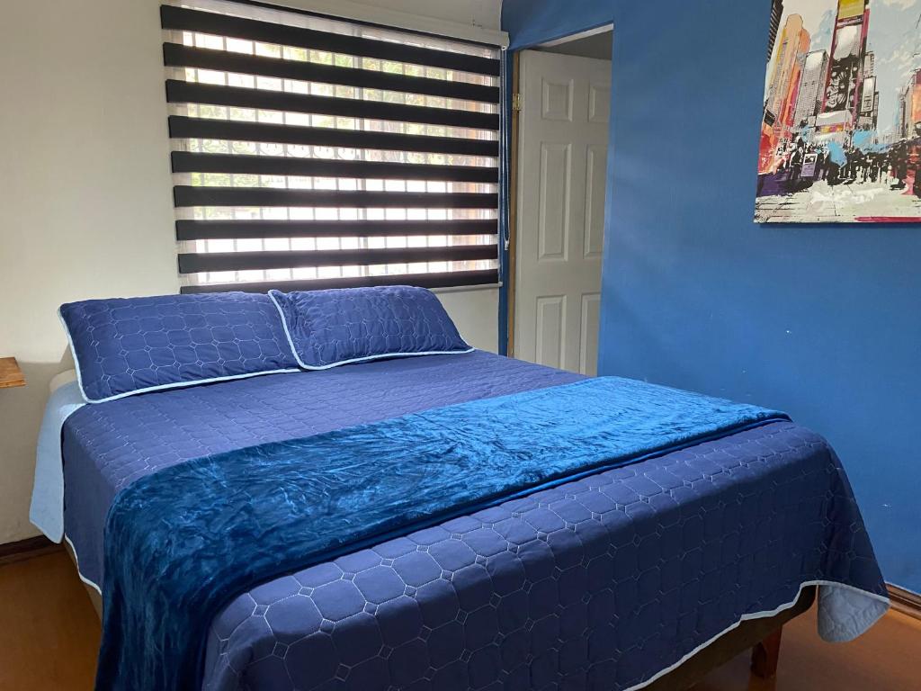 Postel nebo postele na pokoji v ubytování MAKTVB Costanera - Hostal Boutique