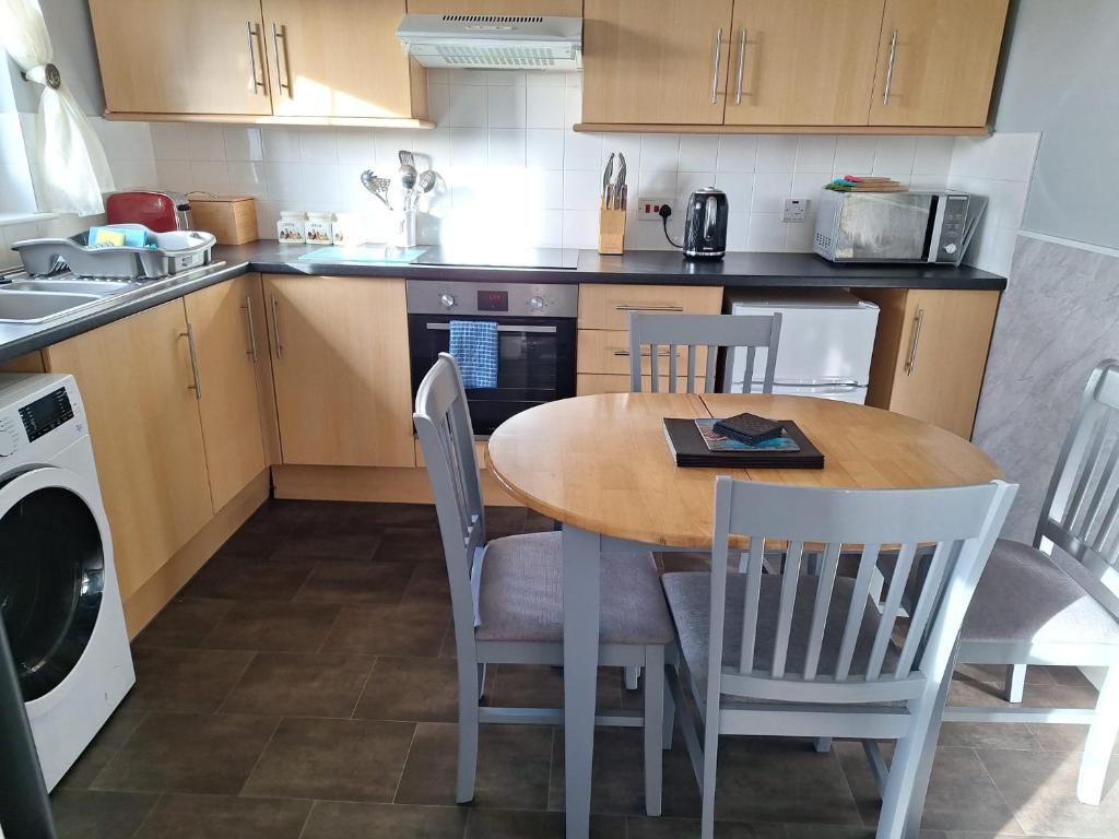 Kuchyň nebo kuchyňský kout v ubytování Apartment 1, Phoenix Flats
