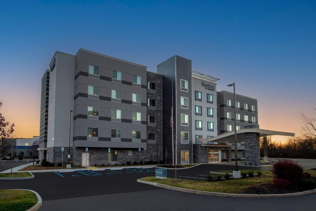 a rendering of a building in a parking lot at Fairfield by Marriott Inn & Suites Indianapolis Plainfield in Plainfield