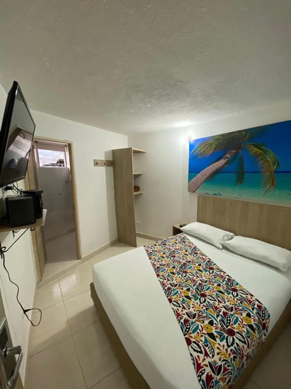 TV a/nebo společenská místnost v ubytování Suites Laureles