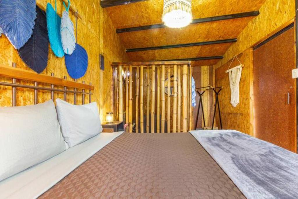 Postel nebo postele na pokoji v ubytování Cabañas Miranda