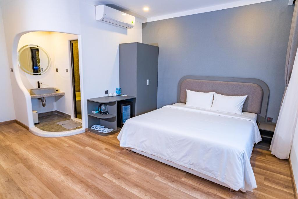 Postel nebo postele na pokoji v ubytování Hafi Boutique Hotel
