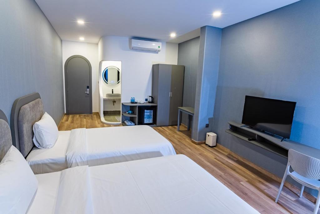Postel nebo postele na pokoji v ubytování Hafi Boutique Hotel