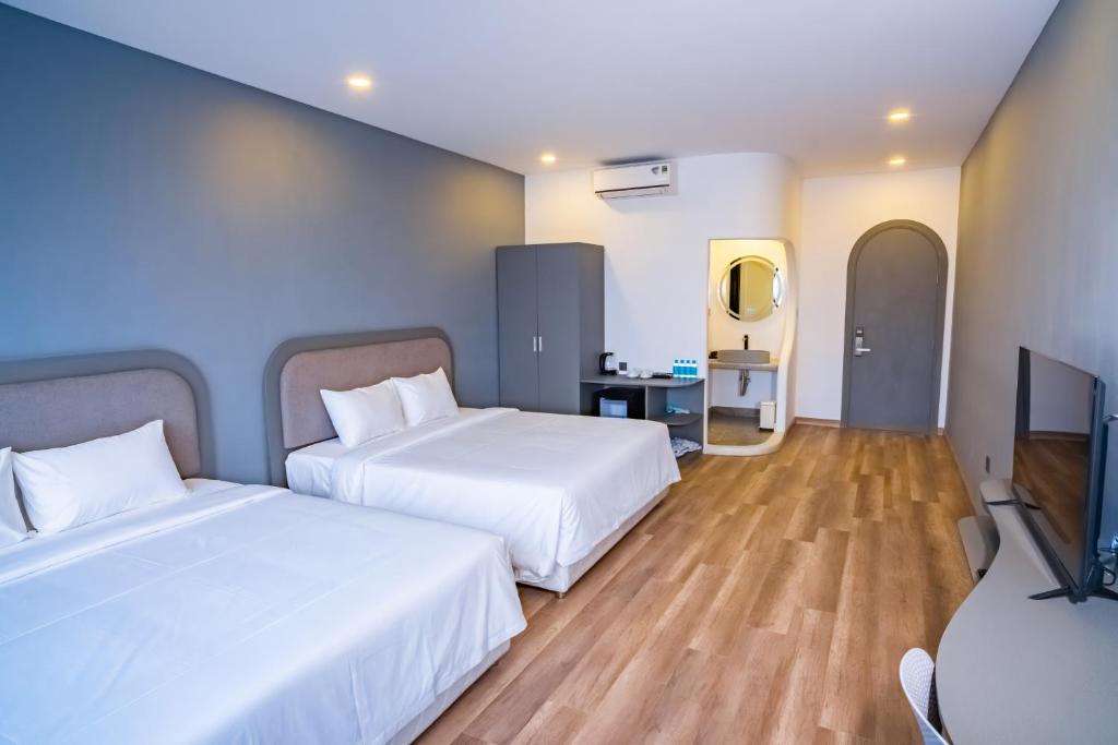 Postel nebo postele na pokoji v ubytování Hafi Boutique Hotel