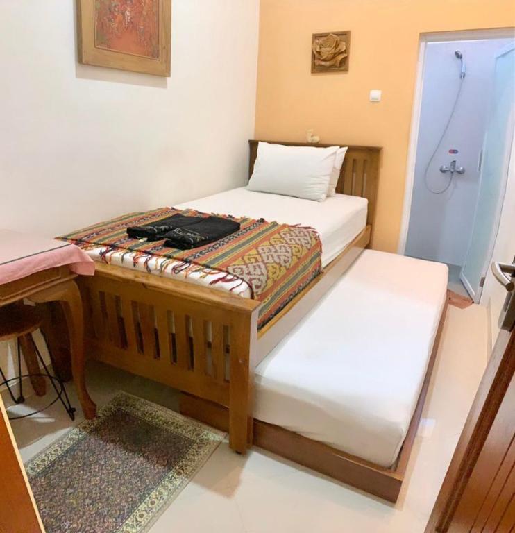 Postel nebo postele na pokoji v ubytování The Cabin Hotel Ambasador