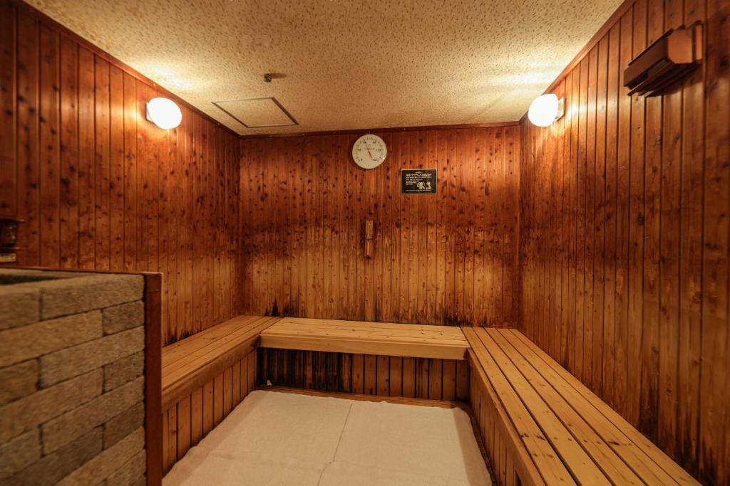 Postel nebo postele na pokoji v ubytování Bayside Hotel Azur Takeshiba