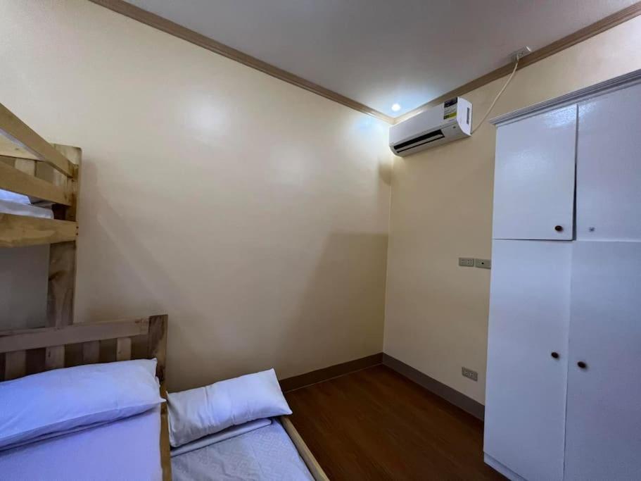 Postel nebo postele na pokoji v ubytování Nielo Apartment