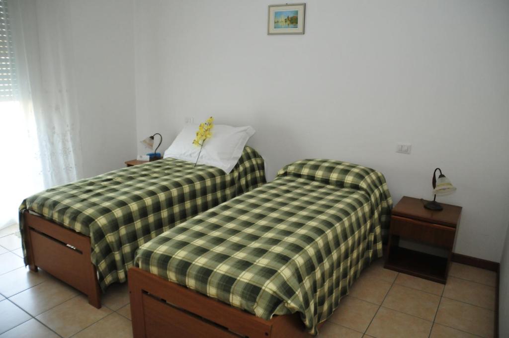 A bed or beds in a room at Casablanca