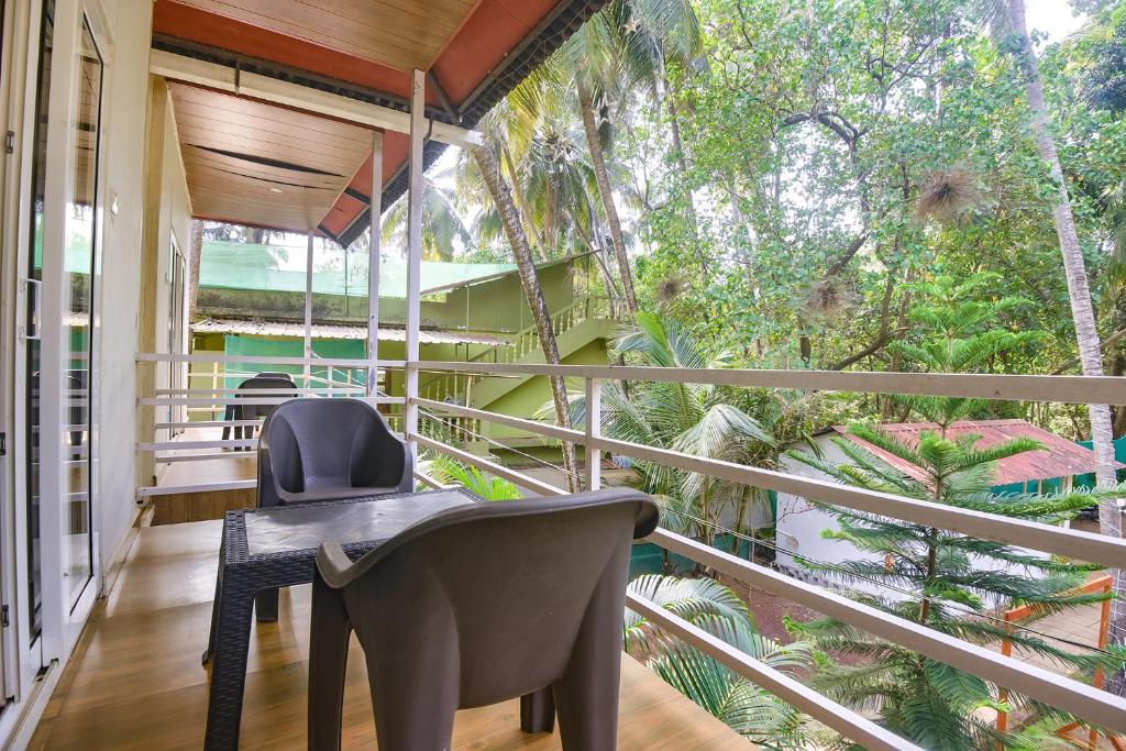 Balkón nebo terasa v ubytování FabHotel La Volga - Nr Morjim Beach