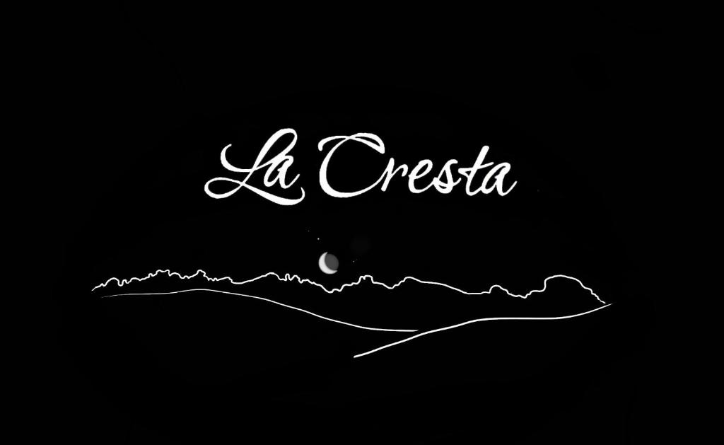 a sign that reads la cyssa with a black background at Agriturismo La Cresta in Arbus