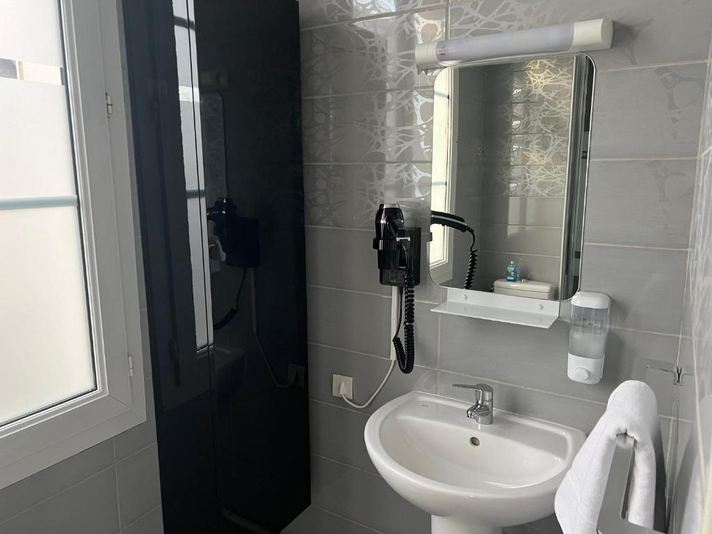 Koupelna v ubytování Armor Hotel