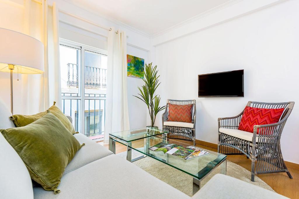 TV a/nebo společenská místnost v ubytování Genteel Home Giralda