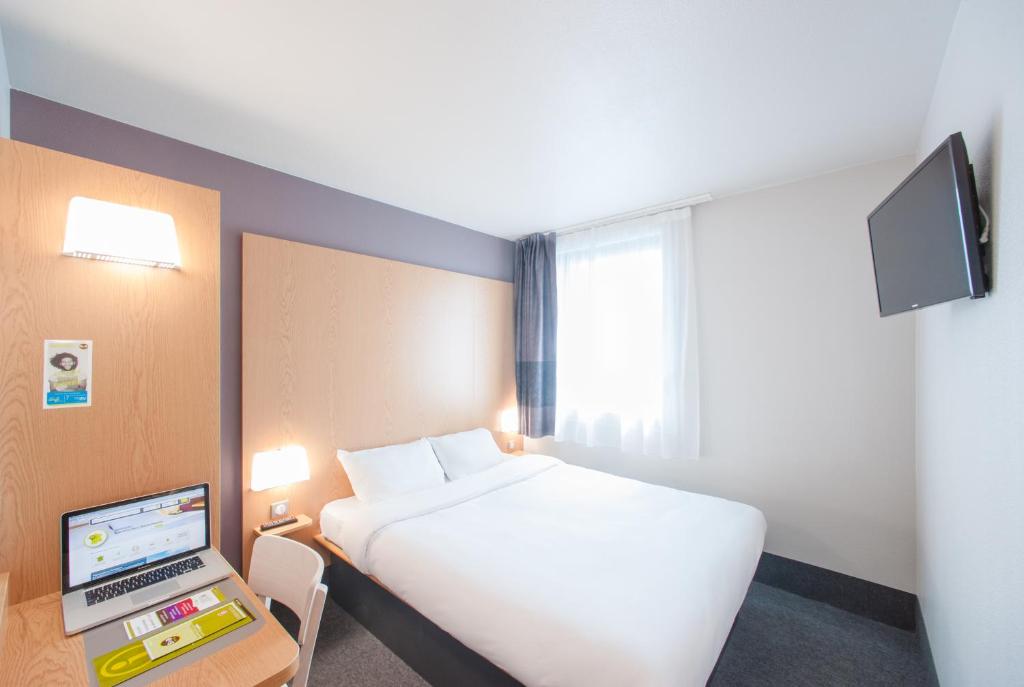 Posteľ alebo postele v izbe v ubytovaní B&B HOTEL Montpellier Centre Le Millénaire