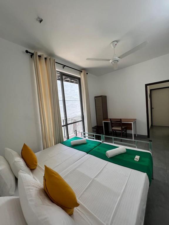 Postel nebo postele na pokoji v ubytování VIBE Hostels