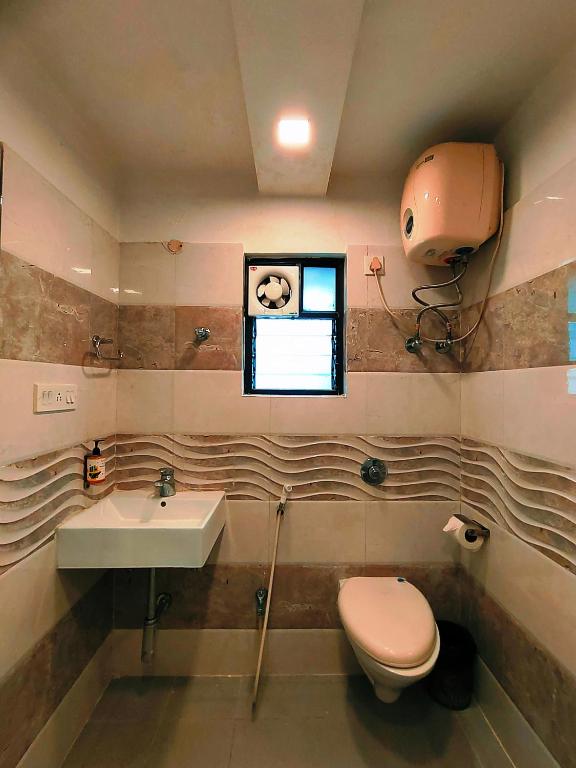 Koupelna v ubytování HOTEL STEAM