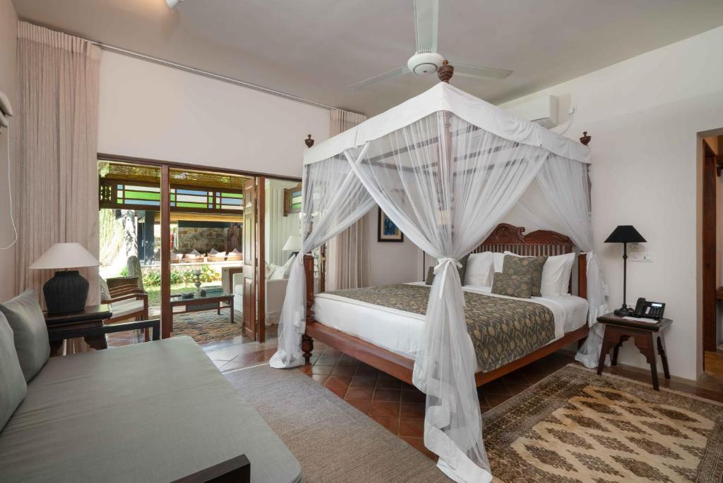 Postel nebo postele na pokoji v ubytování Taru Villas Kandy