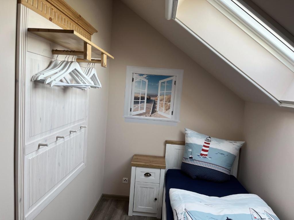 Ein Bett oder Betten in einem Zimmer der Unterkunft Villa di Lago - Ferienhaus mit Sauna