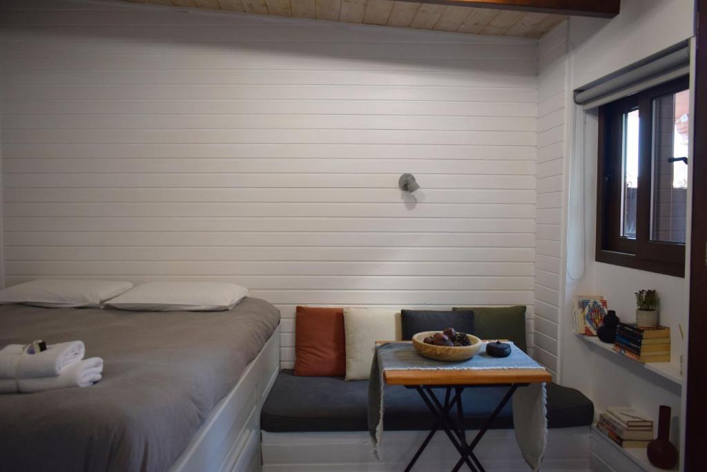 Postel nebo postele na pokoji v ubytování Su Casa Studio