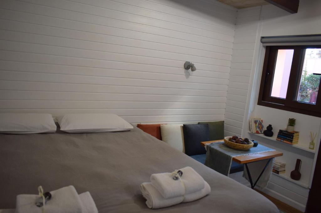 Postel nebo postele na pokoji v ubytování Su Casa Studio