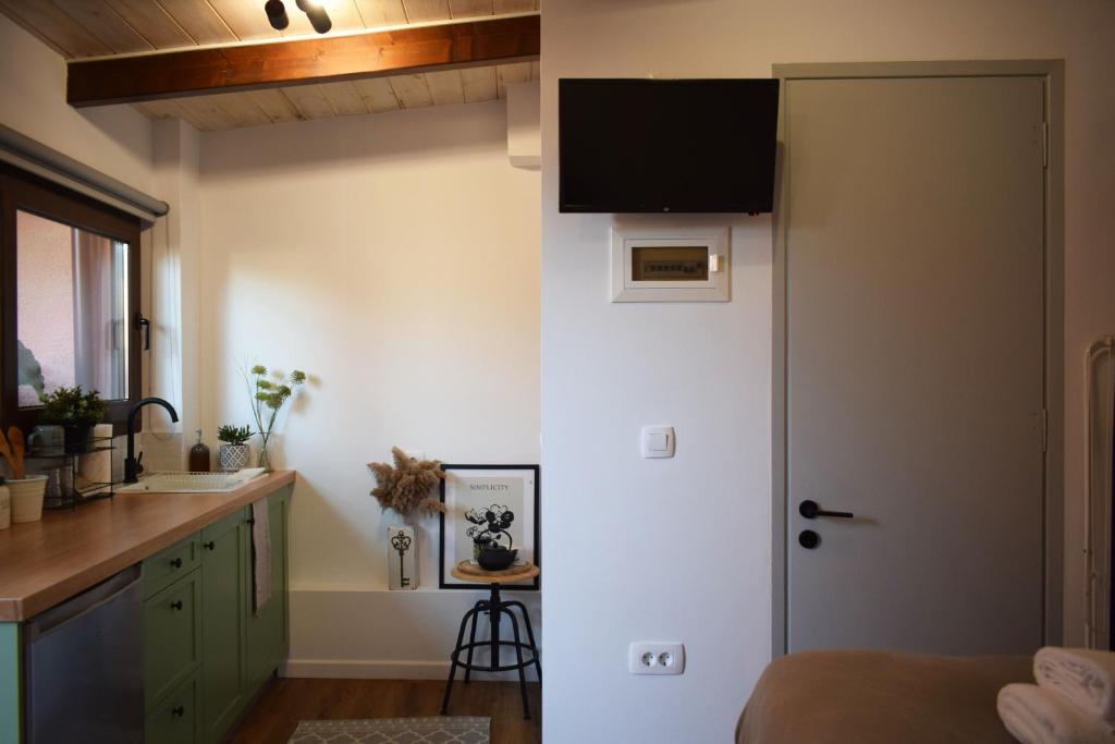 TV a/nebo společenská místnost v ubytování Su Casa Studio