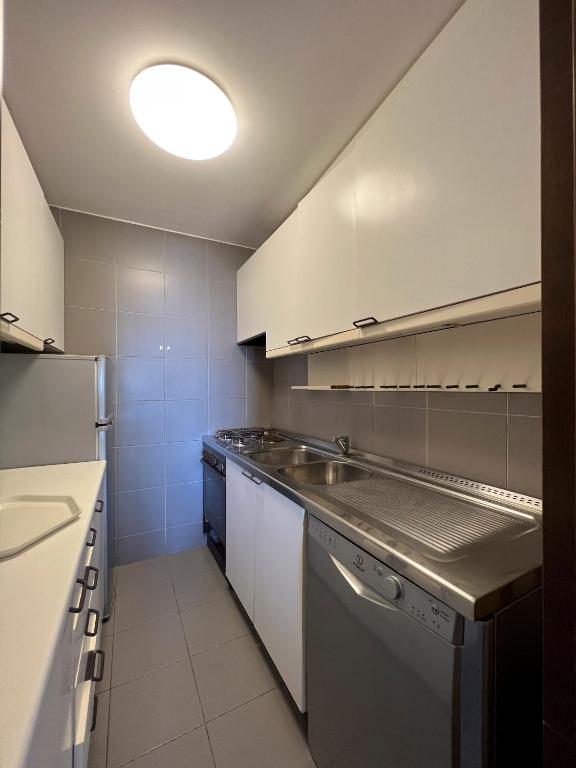 Kuchyň nebo kuchyňský kout v ubytování Miramare apartments