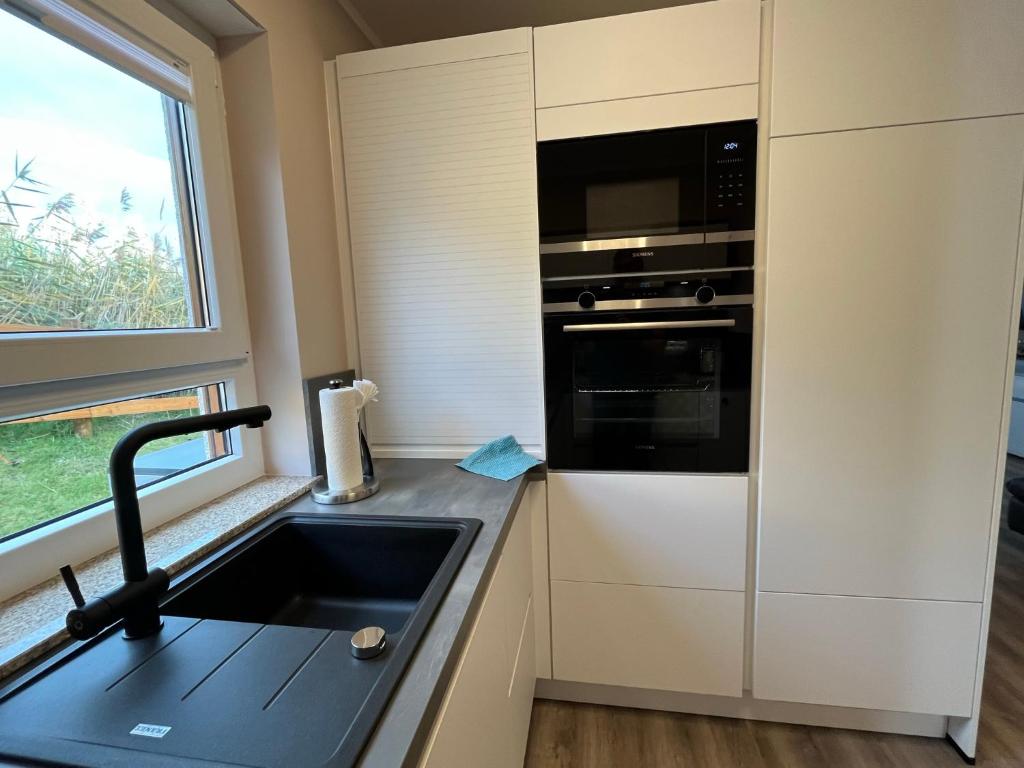 Küche/Küchenzeile in der Unterkunft Villa di Lago - Ferienhaus mit Sauna