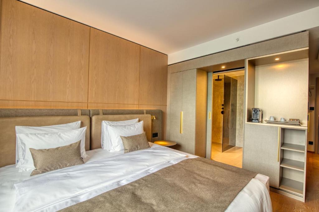 Postel nebo postele na pokoji v ubytování Hotel Meilenstein