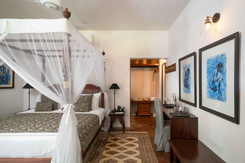 Postel nebo postele na pokoji v ubytování Taru Villas Kandy