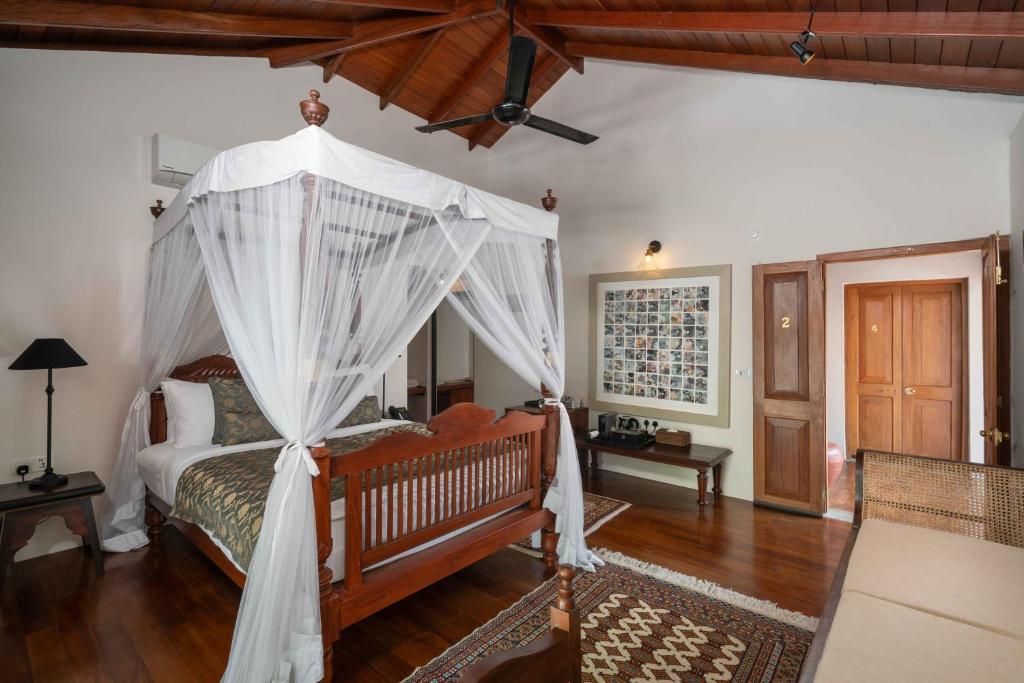 Postel nebo postele na pokoji v ubytování Taru Villas Kandy