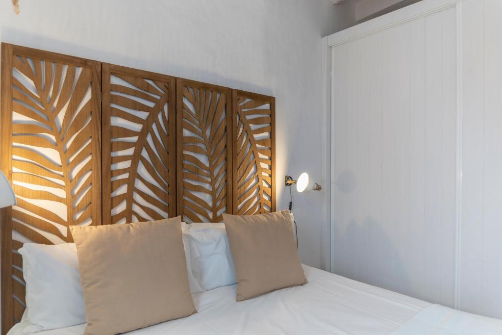 A bed or beds in a room at Casa Azul by Hello Homes Sitges