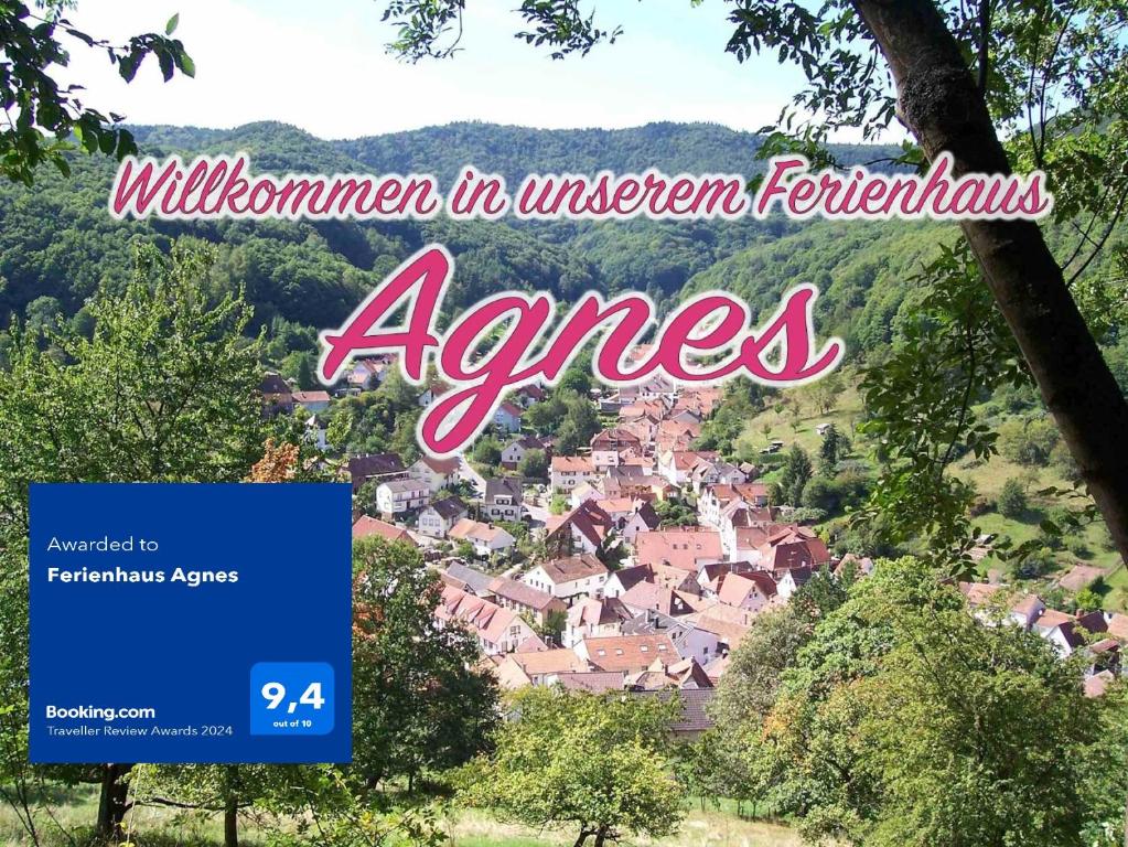 a sign with a view of a town in the distance at Ferienhaus Agnes in Ramberg