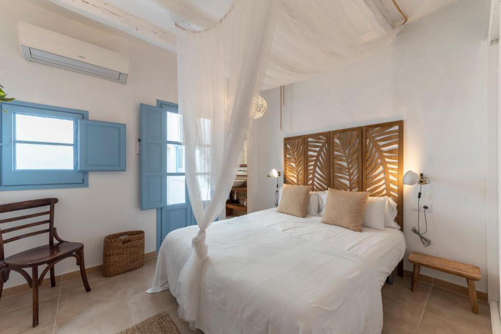 A bed or beds in a room at Casa Azul by Hello Homes Sitges