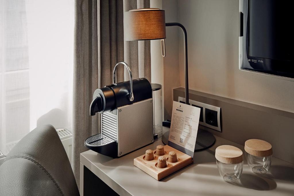 Příslušenství pro přípravu čaje a kávy v ubytování Hotel St. Annen