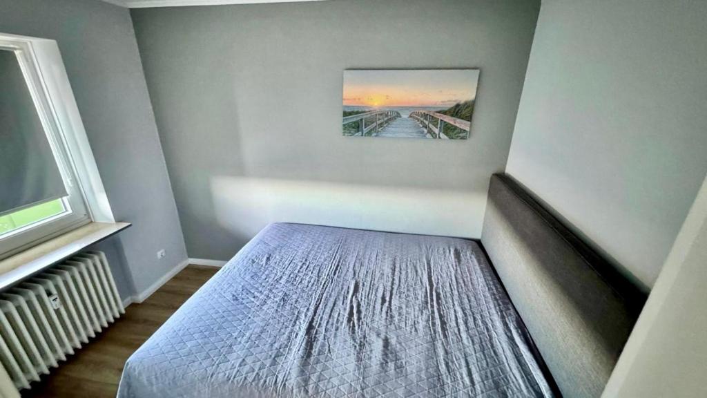 Postel nebo postele na pokoji v ubytování Driftberg 42 Seeluft - Haus A Wohnung 42